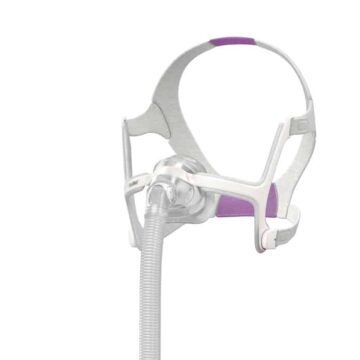 A ResMed Airtouch for Her N20 Nasal CPAP Mask, featuring adjustable straps and a purple cushion for comfort, designed especially for her.