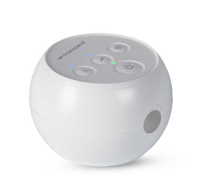 A small white spherical device with buttons and the brand name "Transcend Micro Travel APAP Machine" on top.