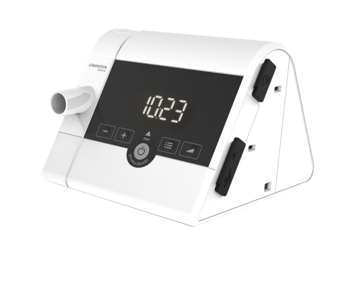 A triangular white digital device, the Lowenstein prismaSMART CPAP/APAP Machine & prismaAQUA Humidifier with 19mm Standard Tubing, displays "10:29" on a screen surrounded by various control buttons and side slots.