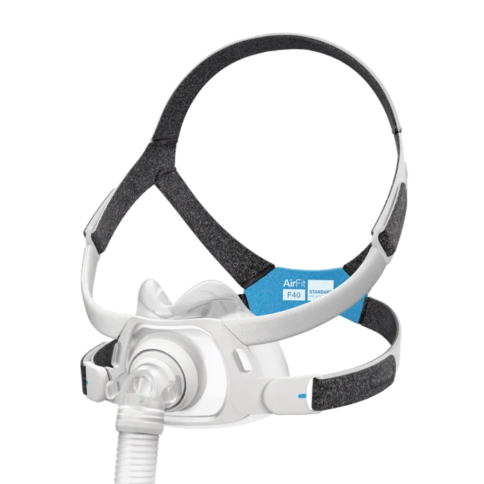 A ResMed AirFit F40 Full Face CPAP Mask in white and blue, featuring standard size straps, designed for sleep apnea therapy.