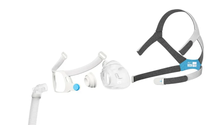 Disassembled ResMed AirFit F40 Full Face CPAP Mask, including headgear, nasal cushion, straps, and tubing, displayed against a white background.