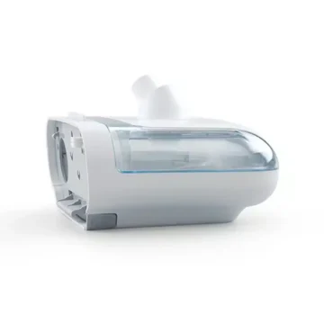 The Respironics DreamStation Heated Humidifier with Chamber, made of white and clear plastic, is shown on a plain white background.