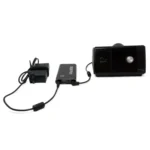 The Medistrom Pilot Flex CPAP Battery (Charcoal Black) is connected to a power bank and an adapter via cables, displayed on a white background.