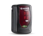 A Nonin Onyx Vantage 9590 Finger Pulse Oximeter in black shows 99% SpO2 and a pulse rate of 82 on its red digital screen.