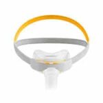 Fisher & Paykel Solo Nasal CPAP Mask (Fit Pack) with a gray and yellow head strap, shown from the front.