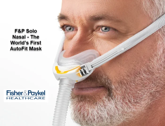 Close-up of a man wearing the Fisher & Paykel Solo Nasal CPAP Mask (Fit Pack), featuring the "F&P Solo Nasal" and Fisher & Paykel Healthcare logos.