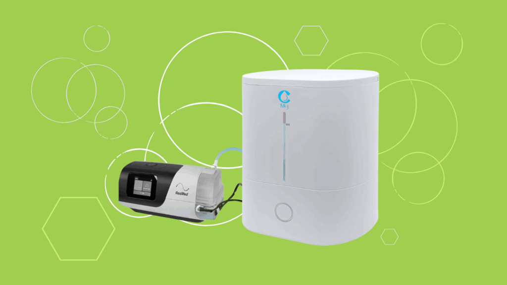 White CSpring MK3 CPAP machine and humidifier with CPAP water chamber on a green background, featuring circle and hexagon designs.