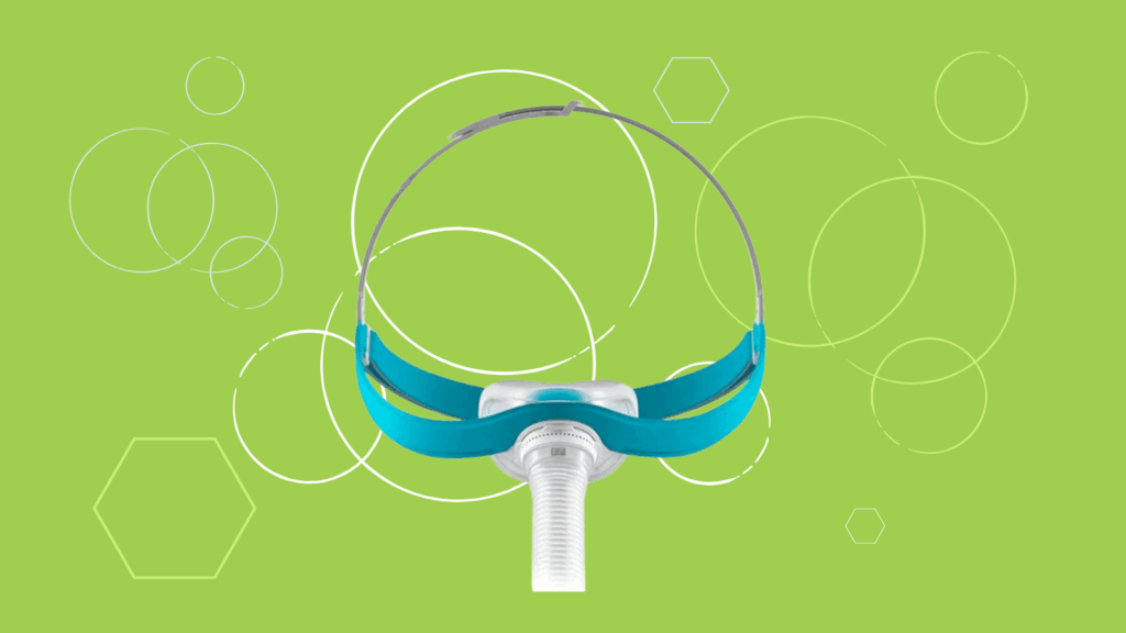 Blue and silver Evora Nasal CPAP Mask by Fisher & Paykel on a green background with white geometric shapes and circles.