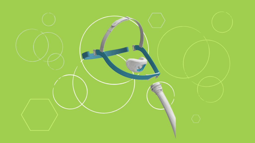 A Fisher & Paykel Evora Nasal CPAP Mask with hose is displayed on a green background with white geometric shapes—ideal for any detailed CPAP Mask Review.
