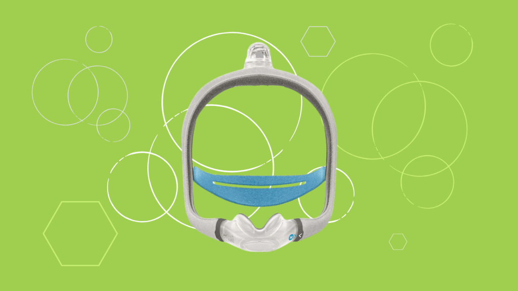 ResMed AirTouch N30i Nasal CPAP Mask with headgear displayed on a bright green background adorned with white circles and hexagons.