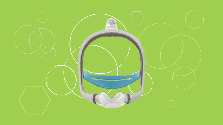 ResMed AirTouch N30i Nasal CPAP Mask with headgear displayed on a bright green background adorned with white circles and hexagons.
