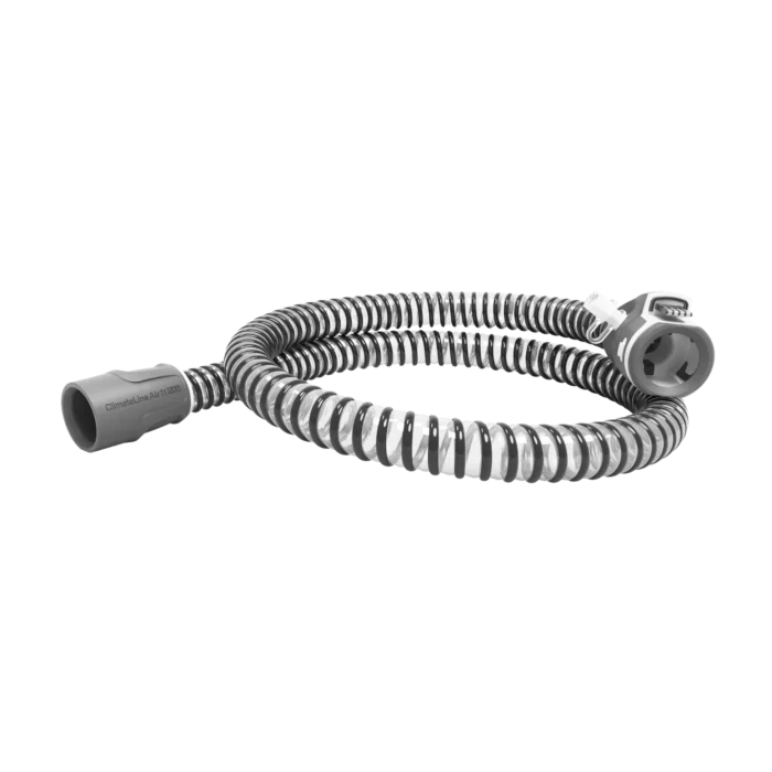 The ResMed ClimateLineAir 11 Oxy Heated Tubing is a coiled, flexible hose with connectors on both ends for Oxy devices, shown on a white background.