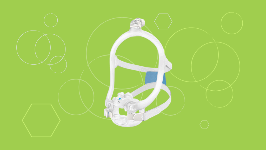 A ResMed AirFit X30i Full Face CPAP Mask with headgear is displayed on a green background featuring circular and hexagonal line designs.