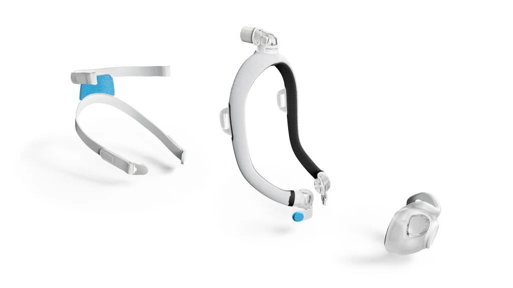 Three white and blue components for the ResMed AirTouch F30i Comfort Full Face CPAP Mask are shown on a plain white background, emphasizing their compatibility and comfort-focused design.