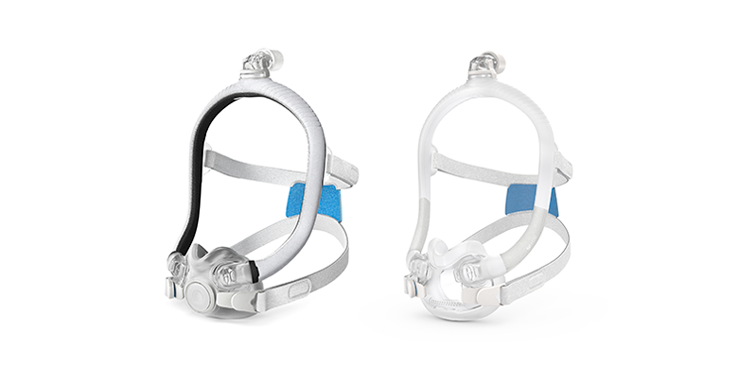 Two white CPAP nasal masks with headgear and blue straps are shown side by side on a white background, highlighting comfort comparable to the ResMed AirTouch F30i Comfort Full Face CPAP Mask.
