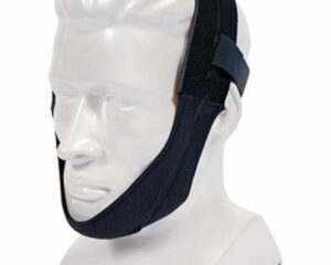 The Respironics Premium Chin Strap is shown on a white mannequin head, securing the chin and sides of the face.